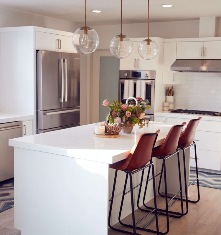 interior view of beautiful kitchen with island counter in new family house